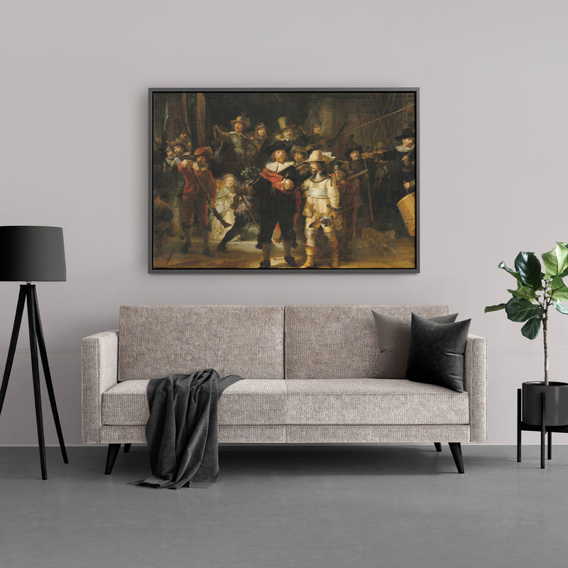 de Nachtwacht op canvas met daaromheen een zwarte, houten lijst